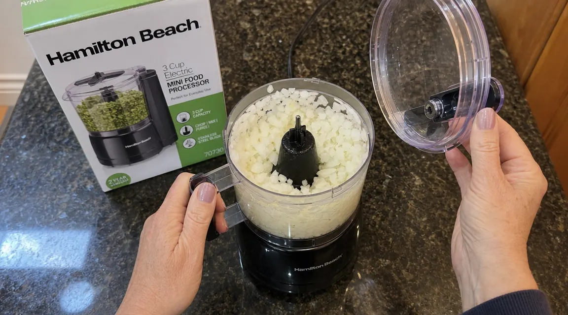 Freshly chopped onion inside the Hamilton Beach food processor bowl after processing